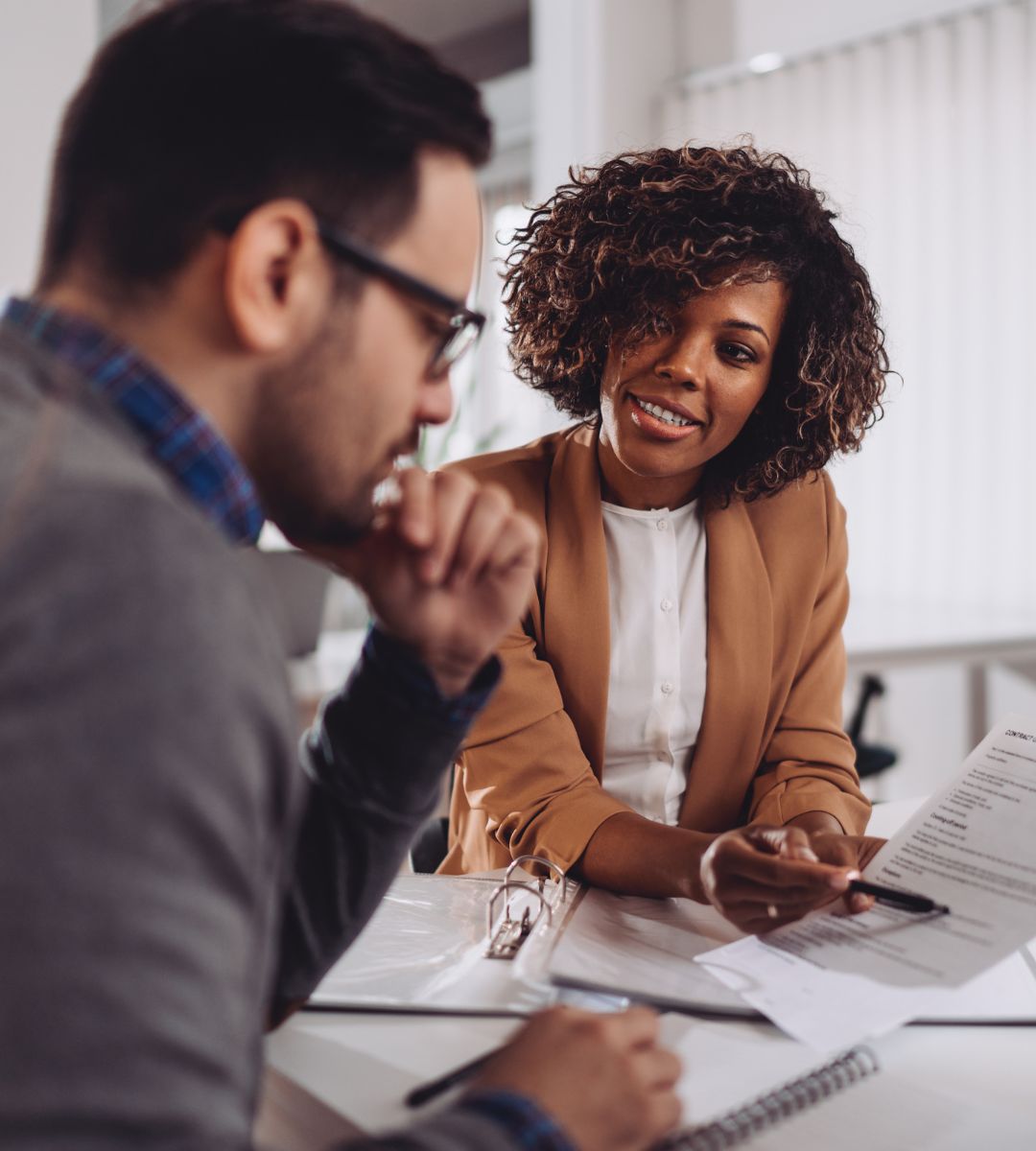 Man and a woman in a consultation meeting